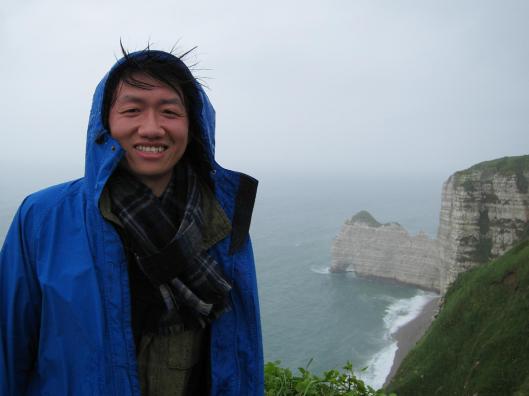 Zhizhong in typical Normandy weather at Étretat.