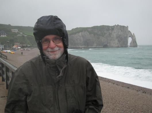 Bob in typical Normandy weather at Étretat.