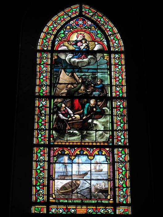 This stained glass window in Cancale vividly evokes the danger of seafaring, and the comfort of religion.