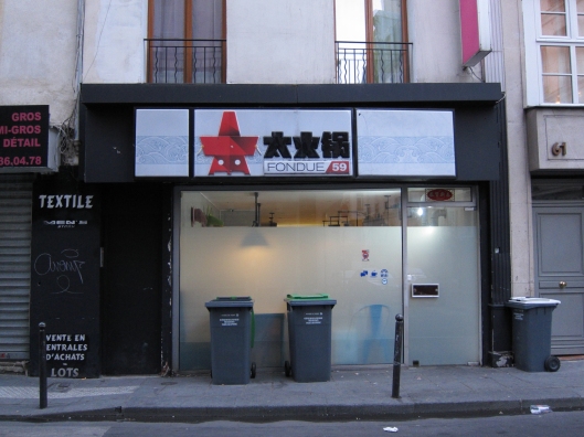 The modest store front of Fondue 59.